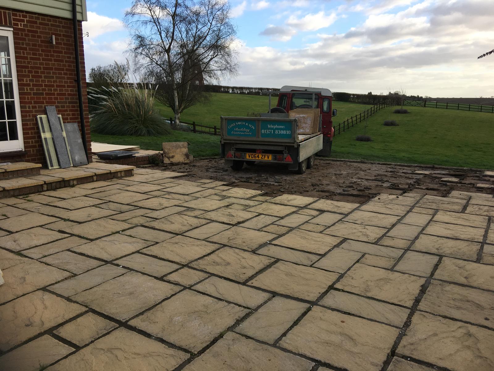 Large stone patio and landscaping work